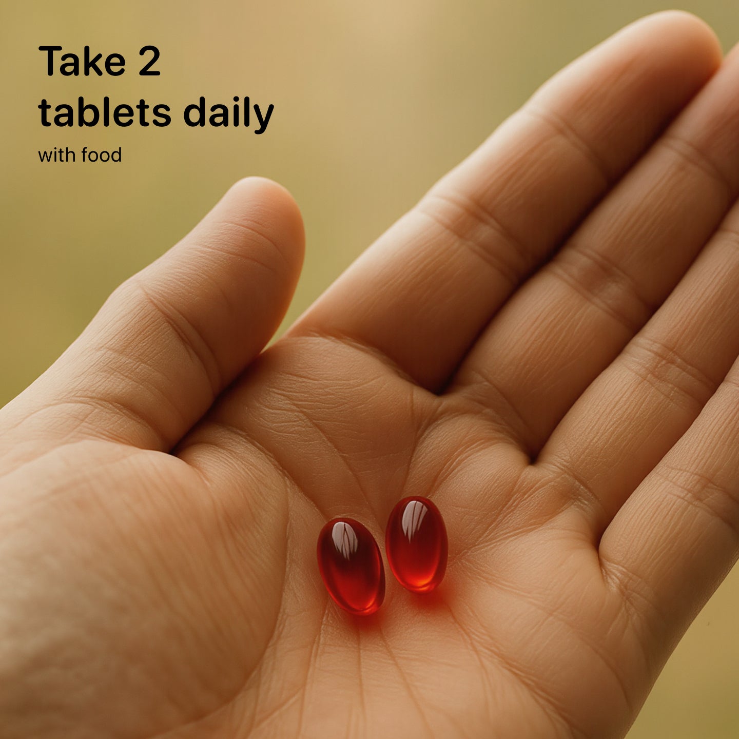 Two SageMD red capsules on a person's palm with text 'Take 2 tablets daily with food' on a yellow background