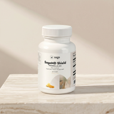 SageMD Shield supplement bottle on a marble surface with a neutral background