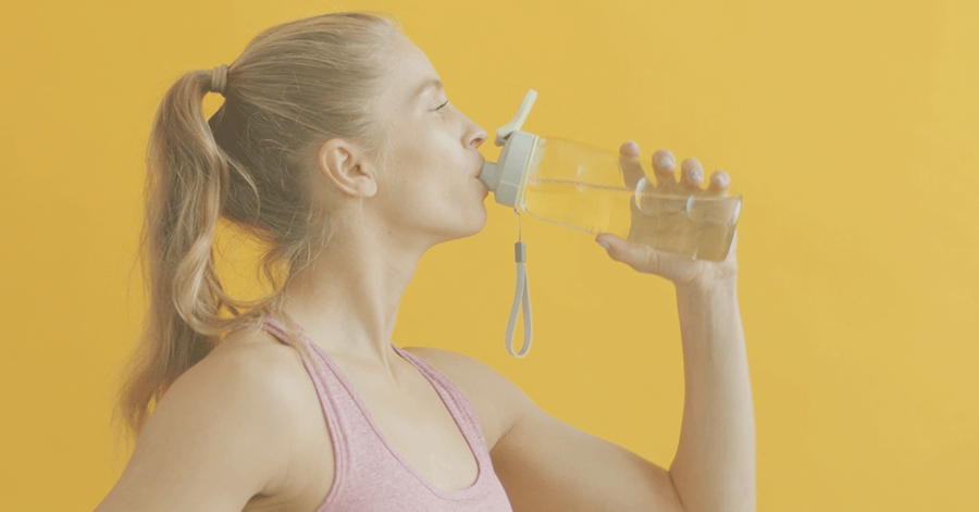 Woman drinking water | Sage Healthspan