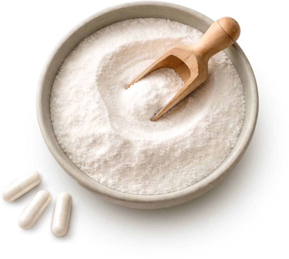 Bowl of white powder with a wooden scoop and small white capsules on a transparent background