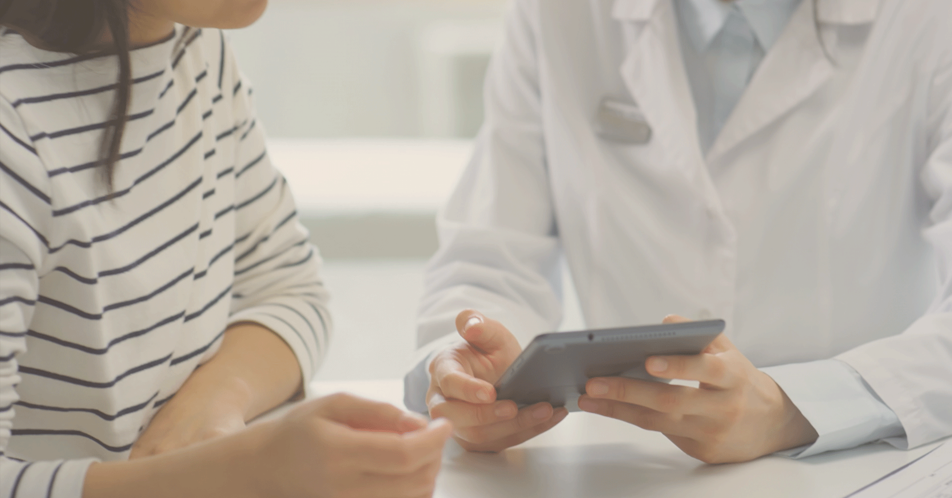 Patient with doctor | Sage Healthspan
